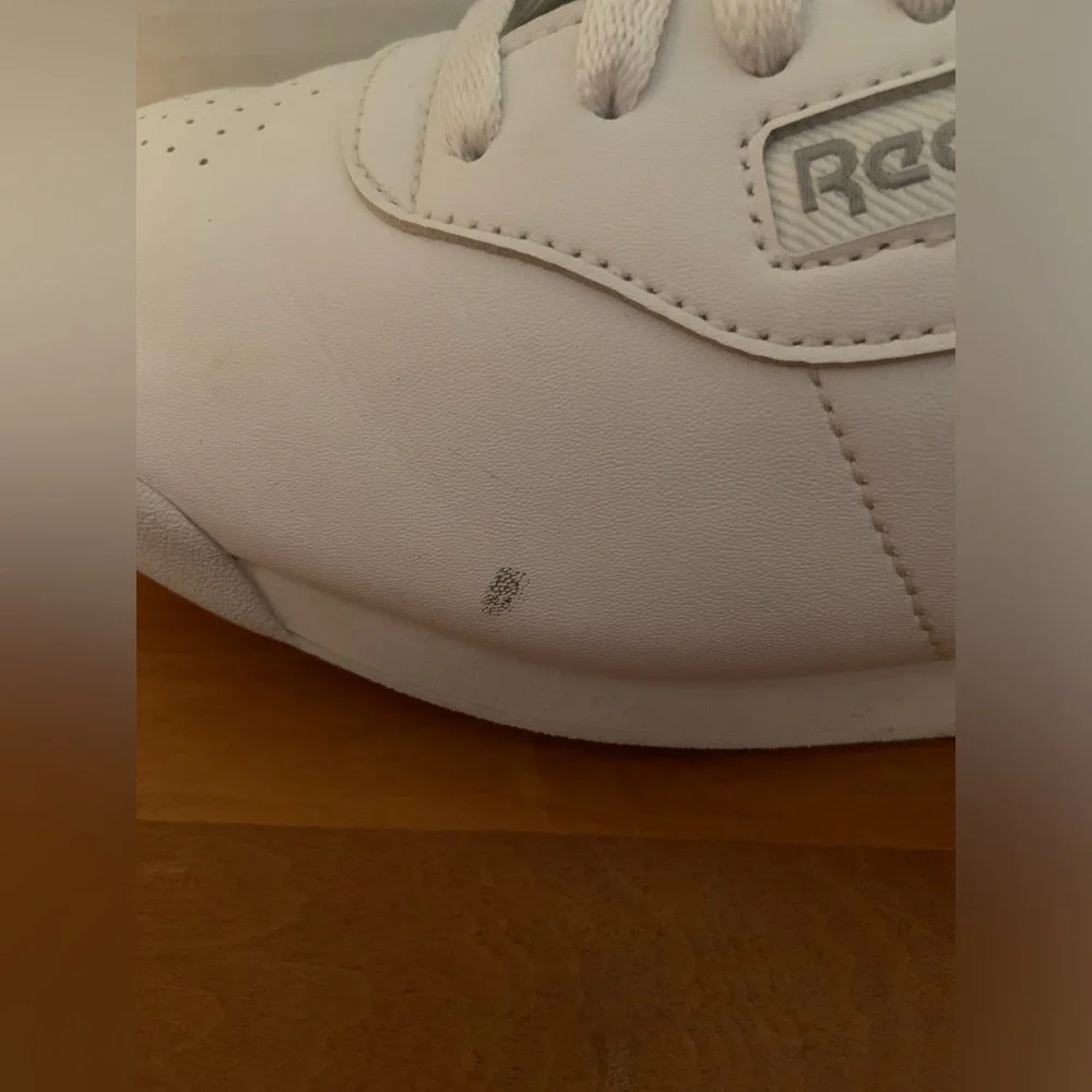 Reebok Classic White Athletic Shoes with Red Logo